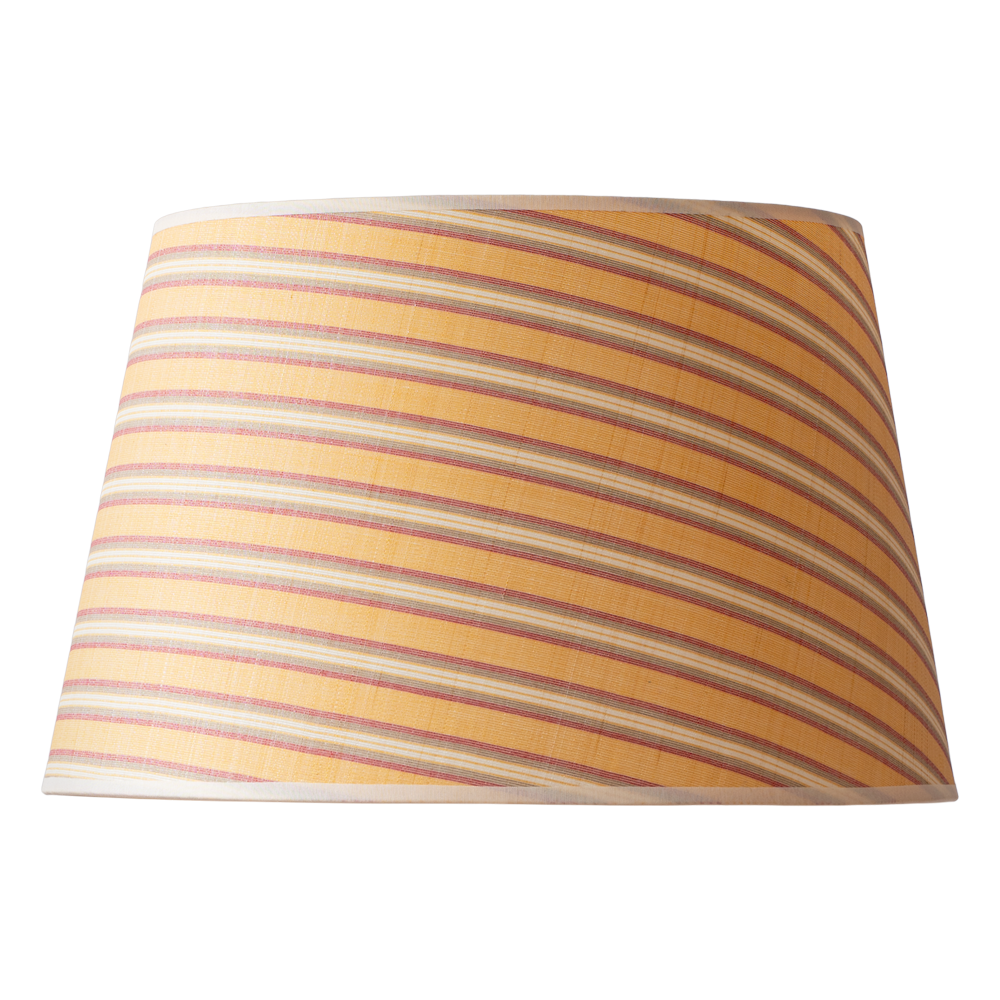 Striped lampshade with yellow and red pattern on a white background