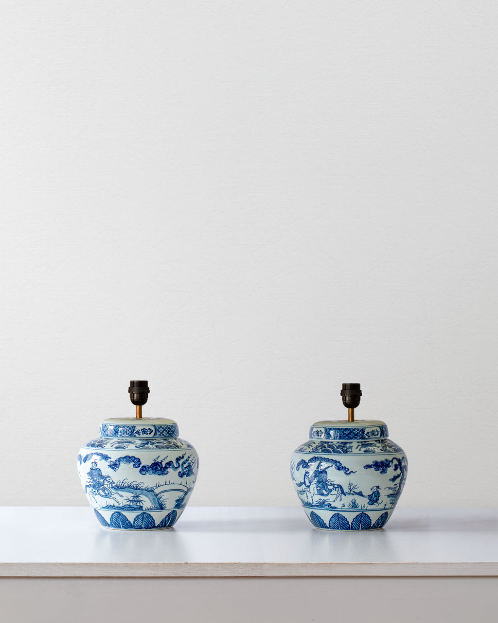 blue table lamps on white table